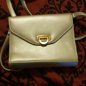Cream silver purse.
